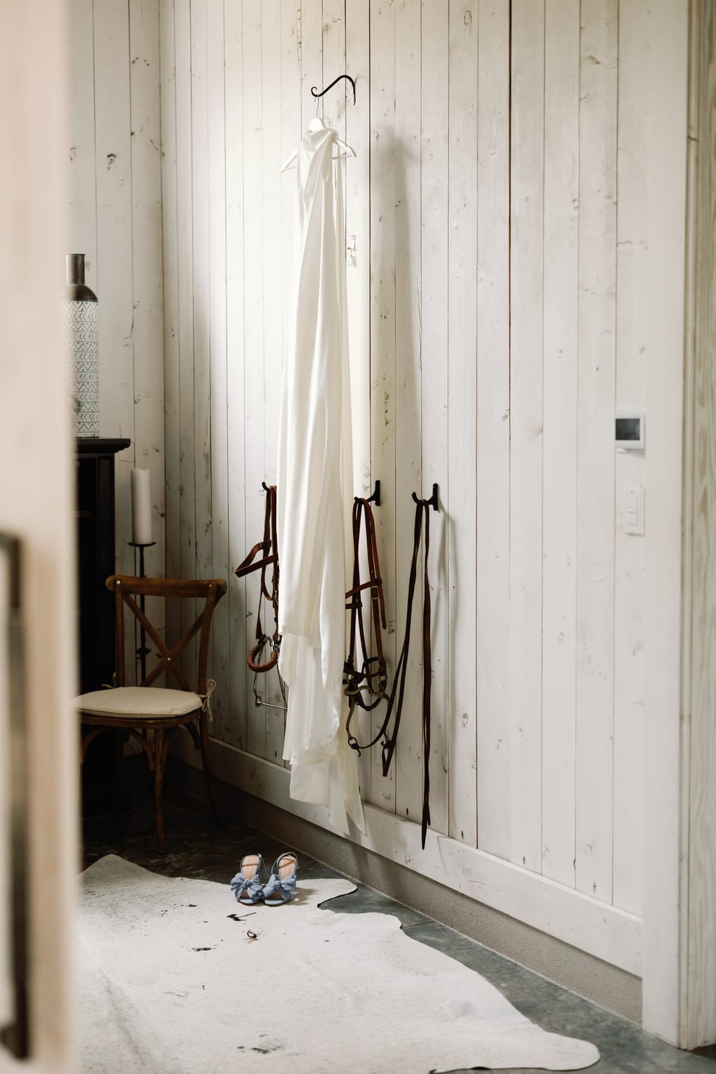 The wedding dress hanging in the tack room at 4U Ranch, Park City, Utah