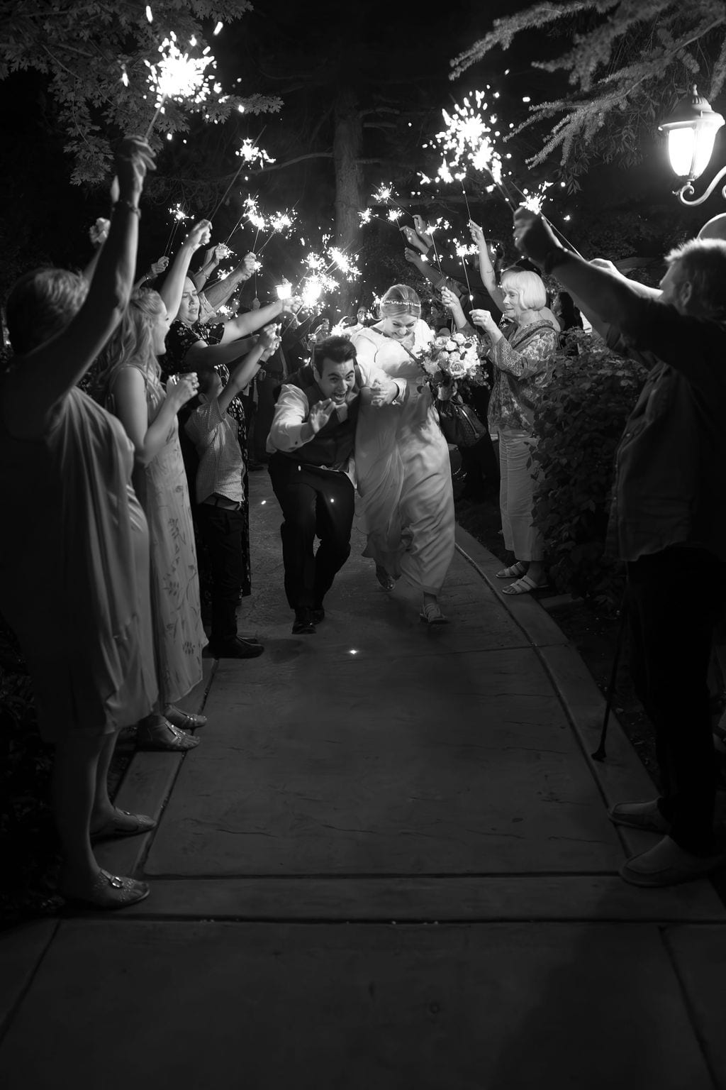 Grace and Miles wedding at Eldredge Manor, the sparkler exit, black and white