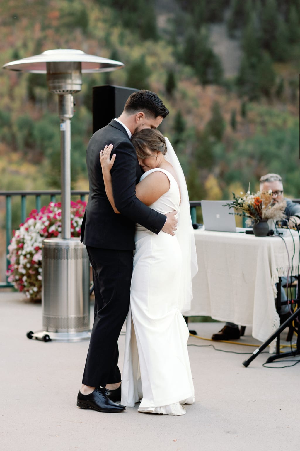 The first dance at dusk with the mountains behind, a private residence in Sundance, Utah